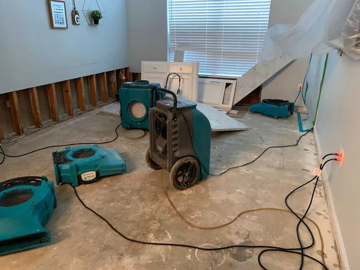 Dehumidifier in flood-cut room for Water Damage Restoration in Willow Springs